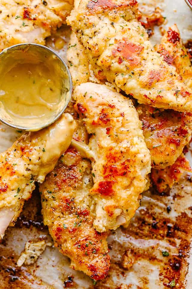 Oven baked chicken tenders served with honey mustard sauce.
