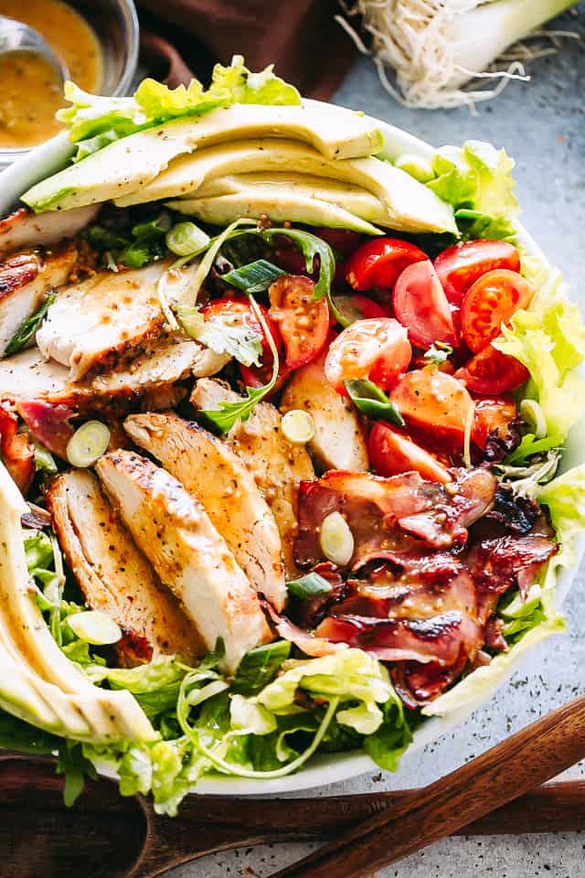 Chicken bacon avocado salad in a bowl.