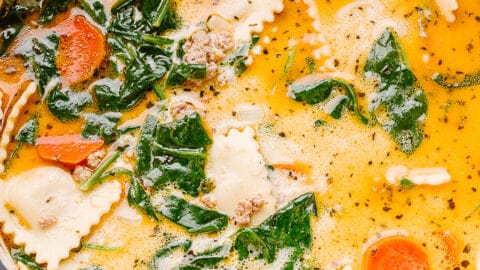 Overhead photo of ravioli soup in a pot.