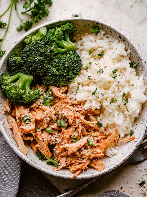 A bowl of Instant Pot honey garlic chicken rice and broccoli