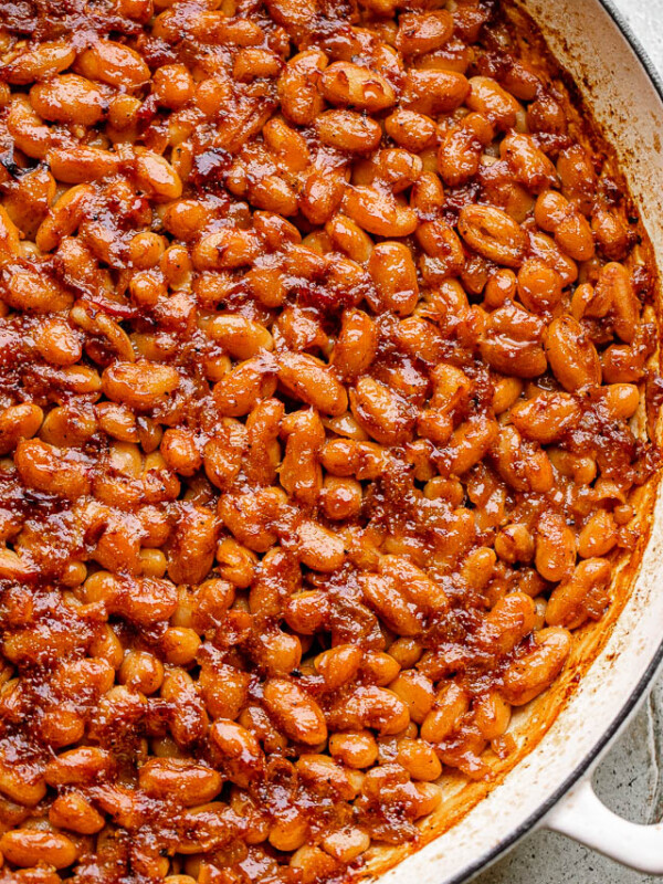 pot of baked beans topped with bacon