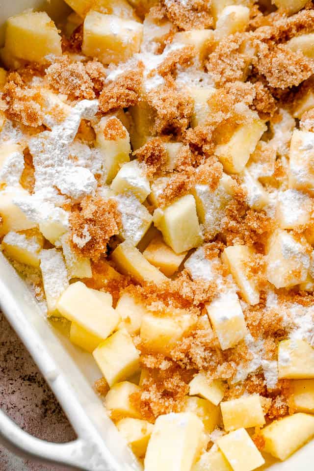 top view of diced apples tossed with brown sugar and flour