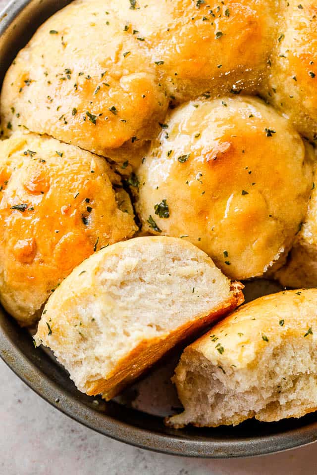 overhead shot of a pan with baked dinner rolls