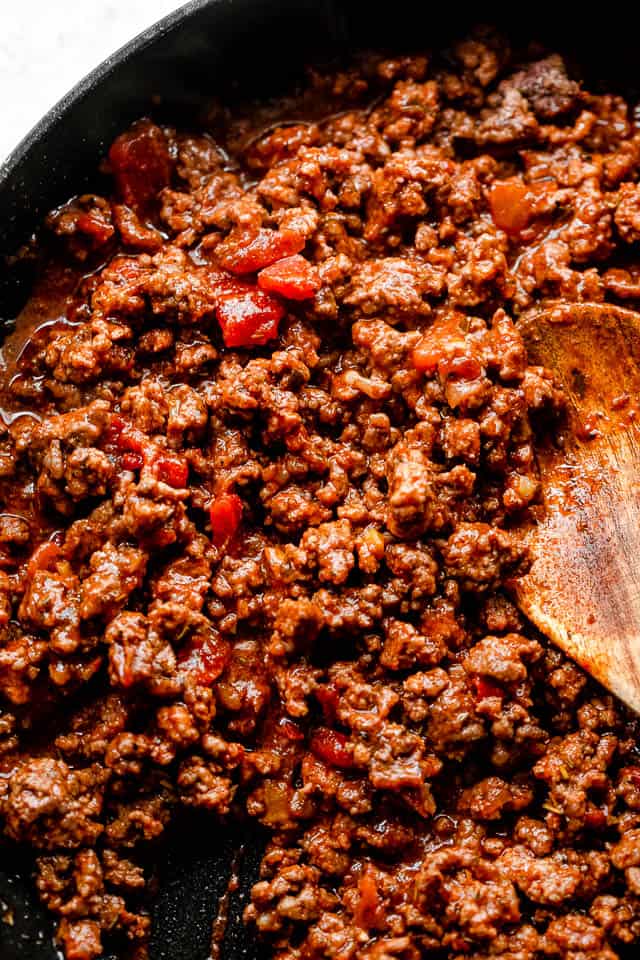 top shot of cooking ground beef in a black skillet