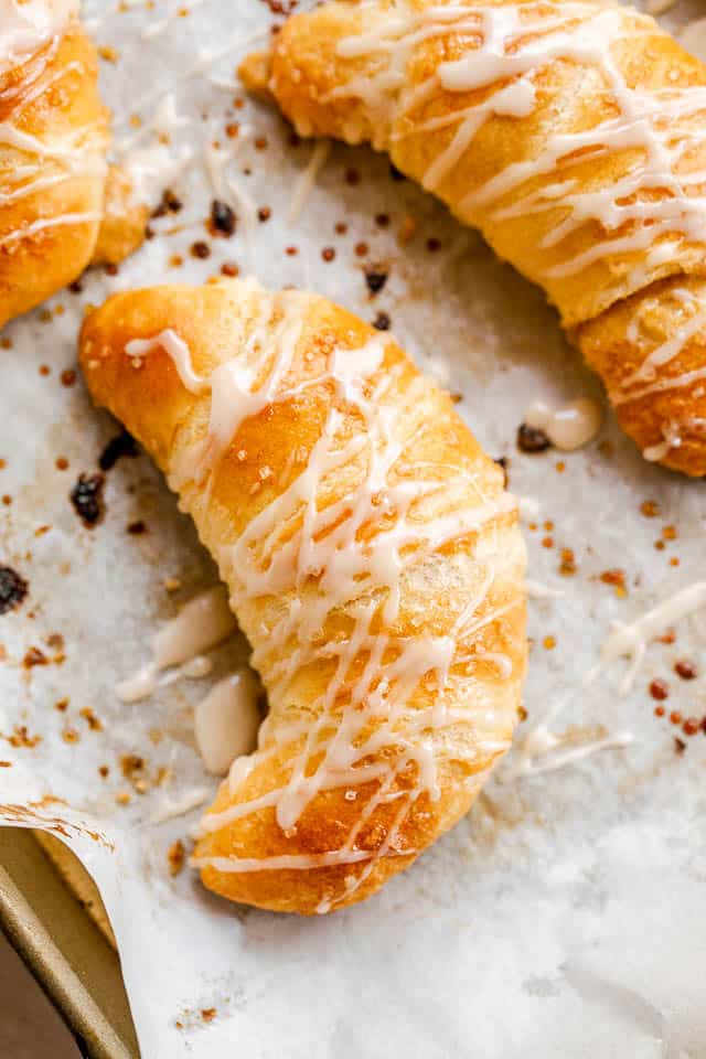 top shot of glazed pumpkin cheesecake crescent rolls