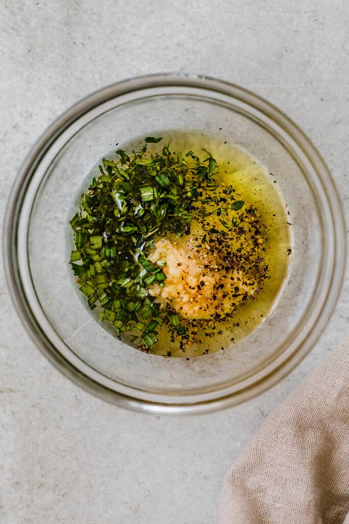 glass bowl with marinade for chicken
