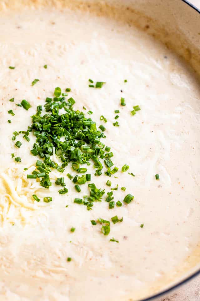 creamy cheese sauce with chopped chives
