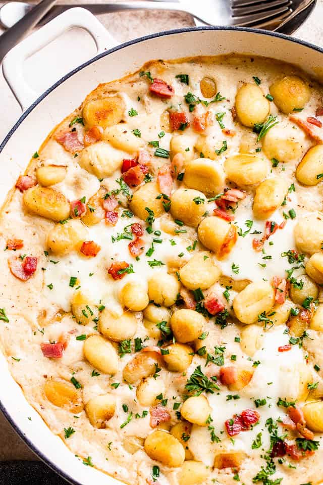 overhead shot of a baking dish with gnocchi bacon casserole