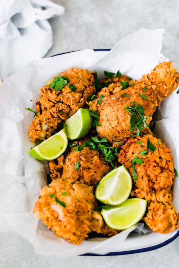 Fried Chicken in a Dish Lined with A Piece of Parchment Paper