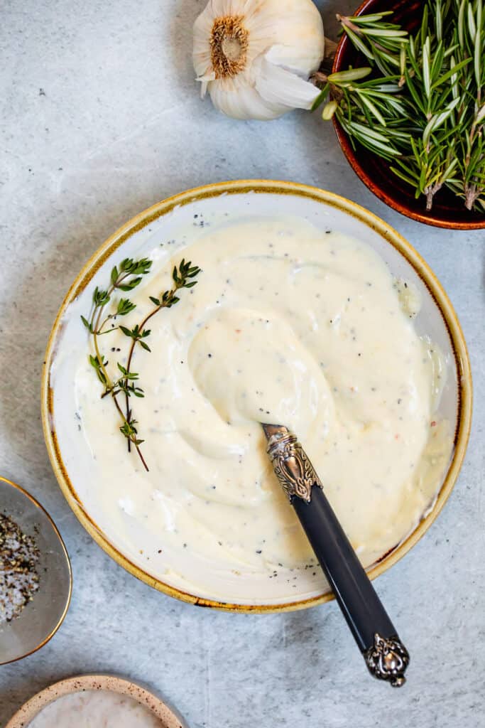 A Bowl of Homemade Horseradish Sauce with a Fancy Spoon Inside