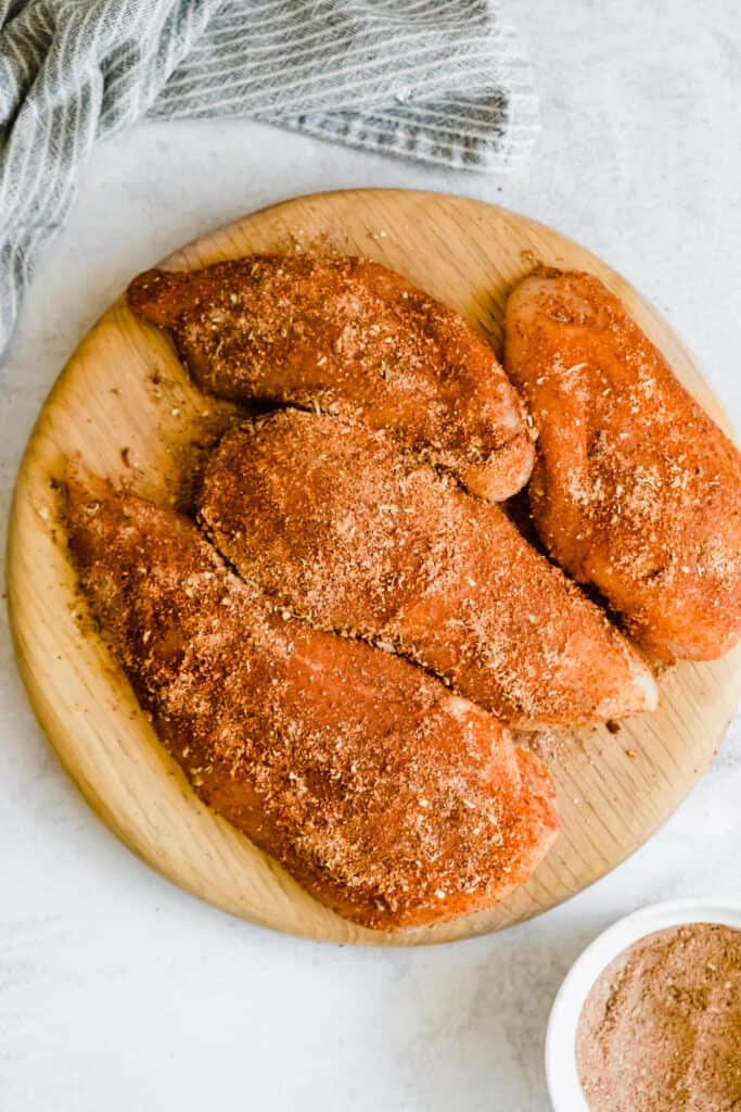 Four Chicken Breasts Covered in Creole Seasoning