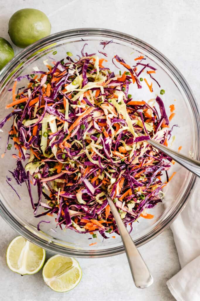 The Completed Asian Cabbage Slaw in a Large Glass Bowl