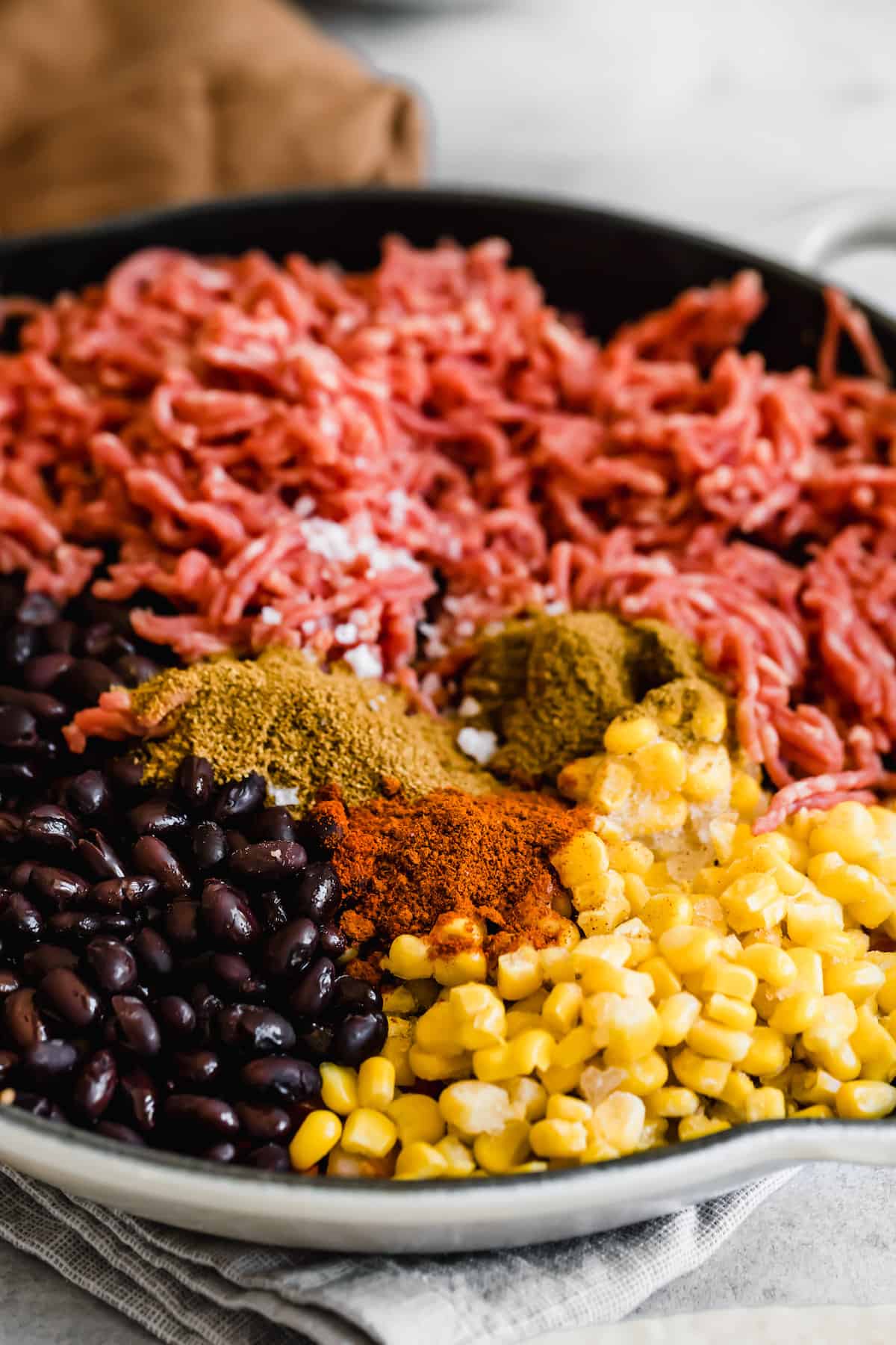 Corn, Ground Beef and Black Beans in a Skillet with Mexican Spices