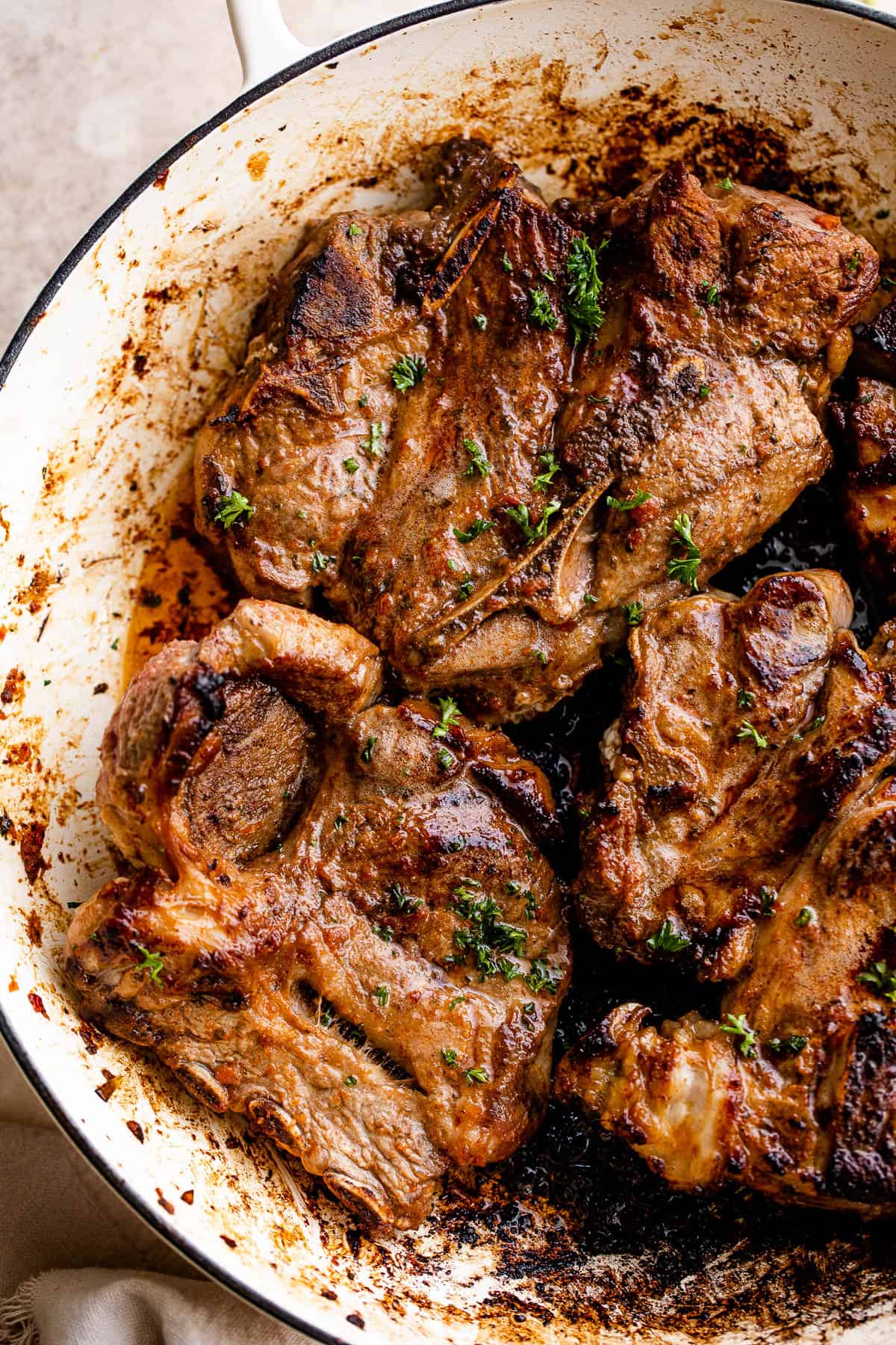 cooking lamb chops in a skillet