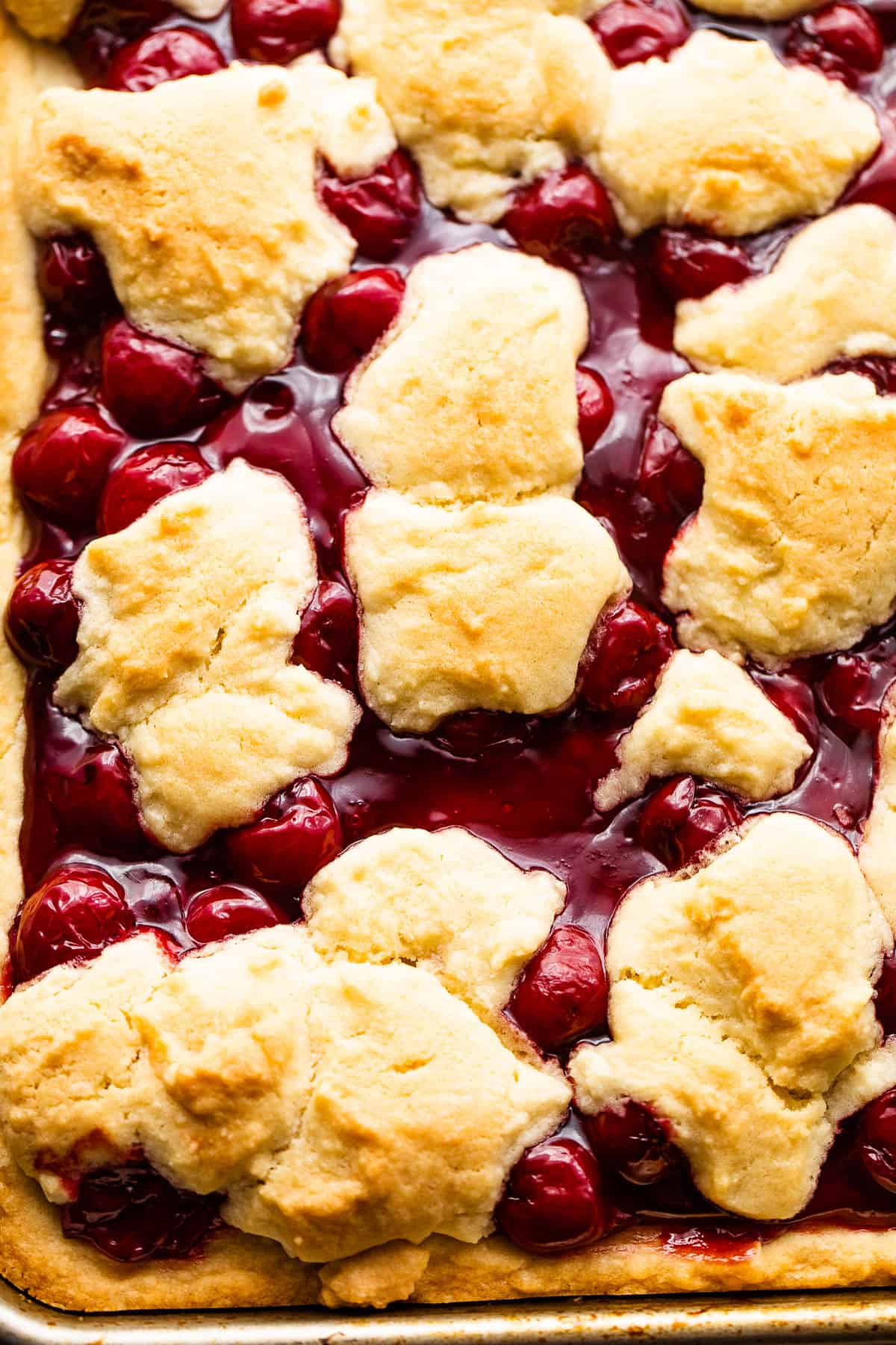 Pan of Cherry Kuchen Bars Topped with Glaze