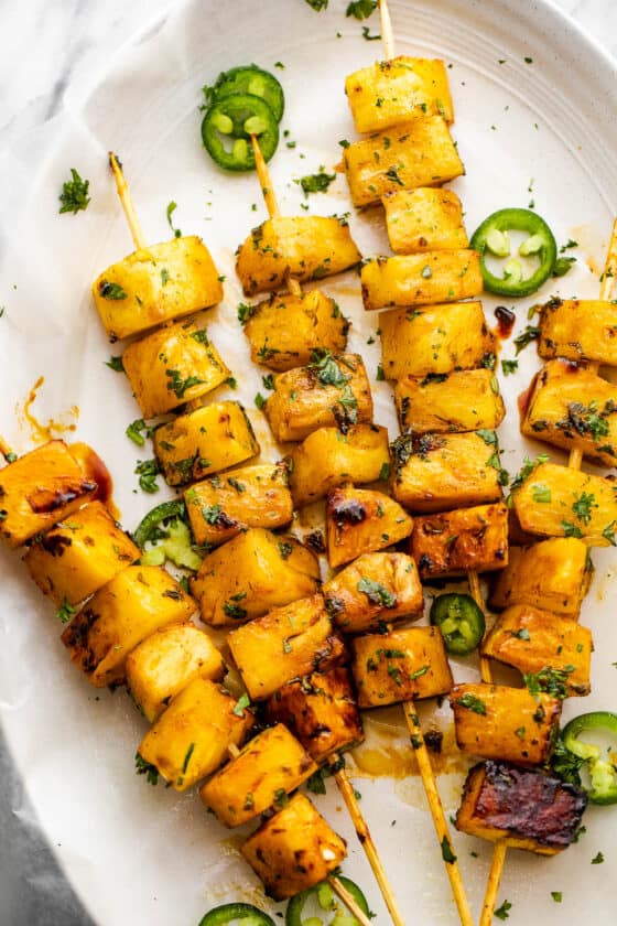five skewers with pineapples