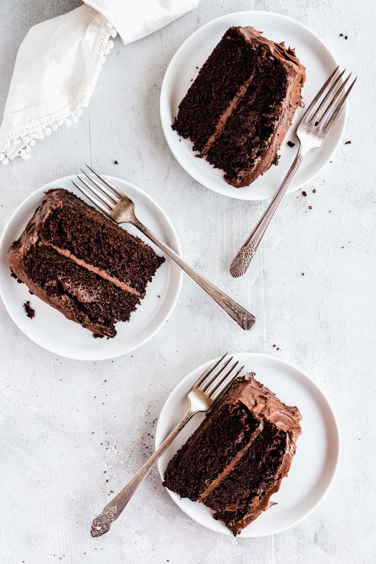 A Bird's-Eye View of Three Slices of Homemade Chocolate Layer Cake