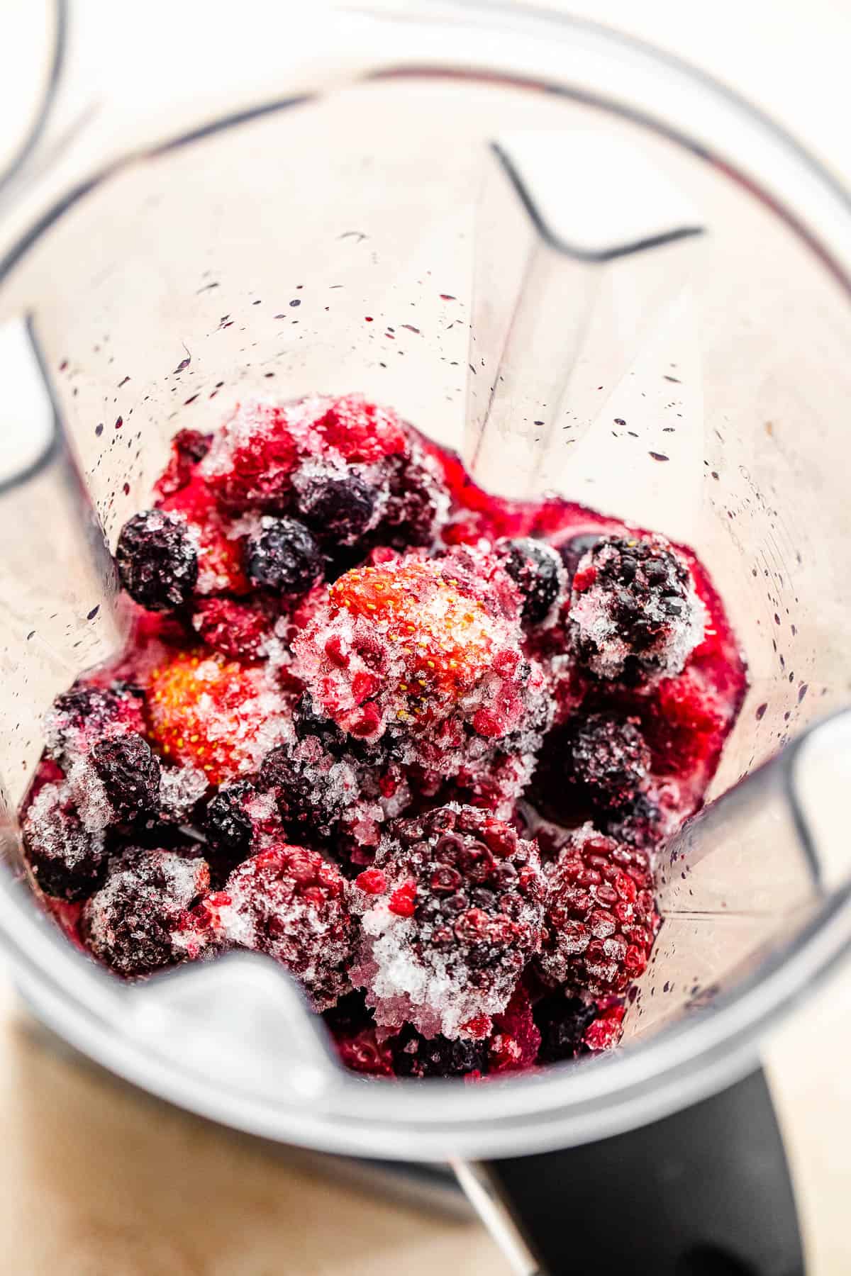 frozen berries in a blender