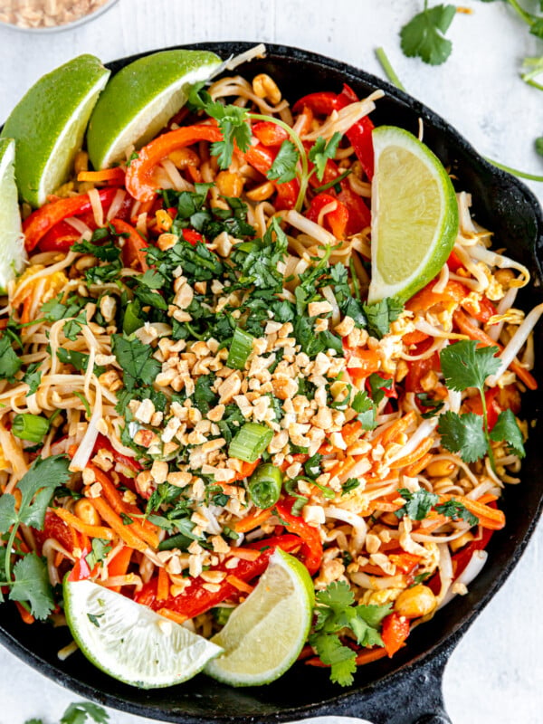 Homemade Pad Thai in a black skillet.