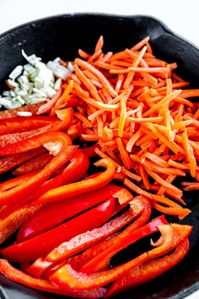 Raw Bell Peppers, Bean Sprouts and Shredded Carrots in a Skillet