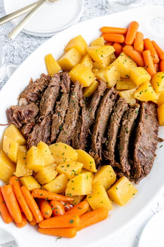Pot roast, potatoes and carrots on a plate