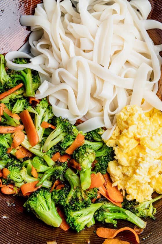 A Bowl of Cooked Rice Noodles, Eggs and Vegetables