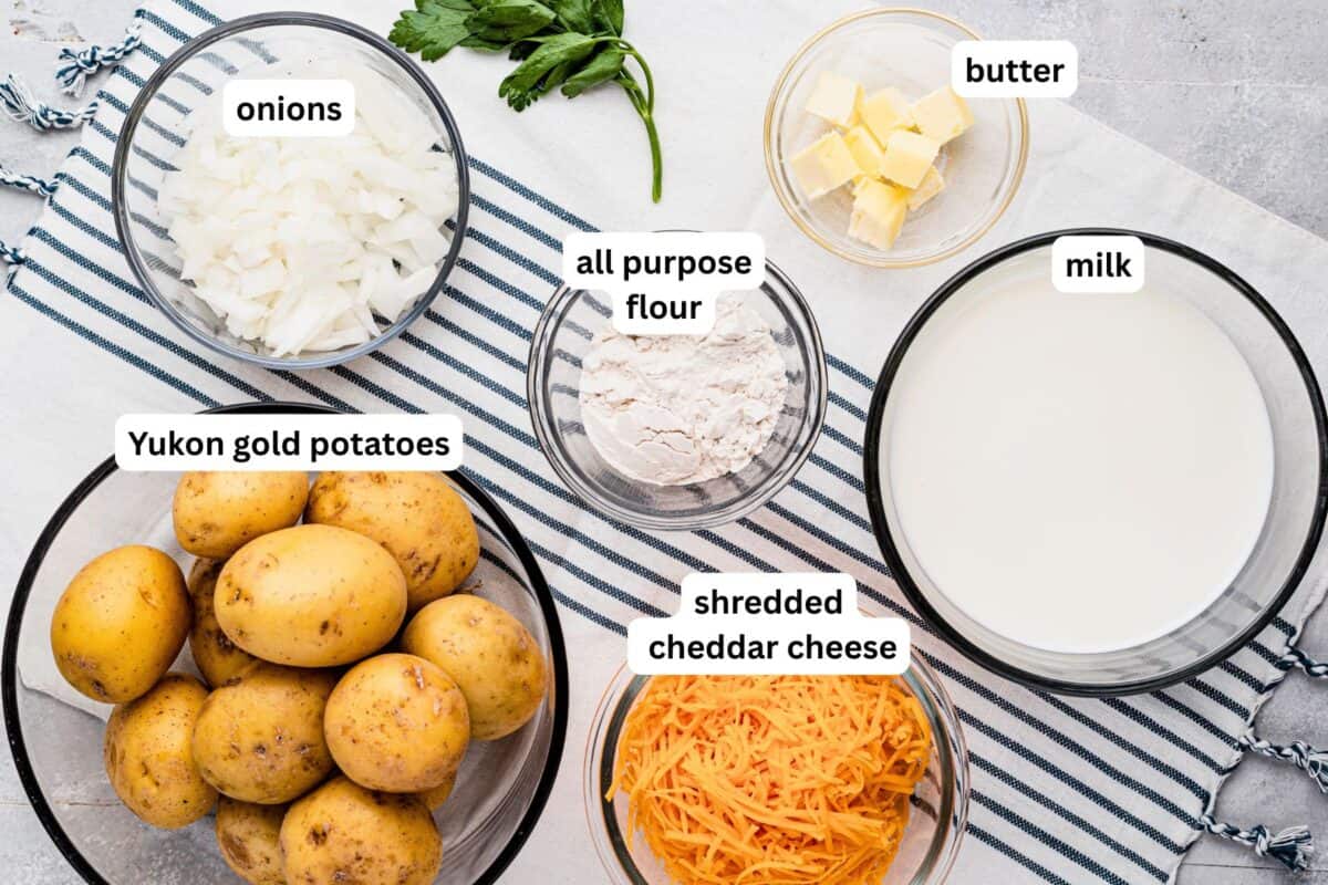 Tender sliced potatoes layered with cheddar cheese and diced onions to make a scalloped potatoes casserole. Ingredients for scalloped potatoes with labels.