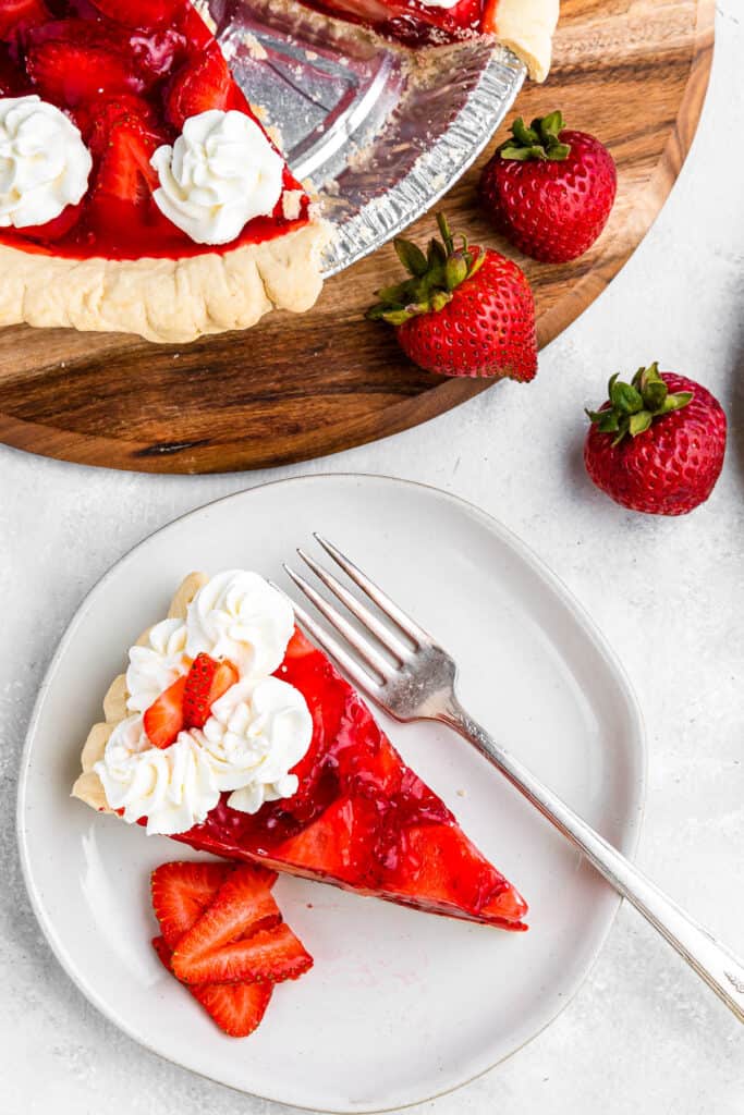 overhead shot of strawberry pie and strawberry pie slice