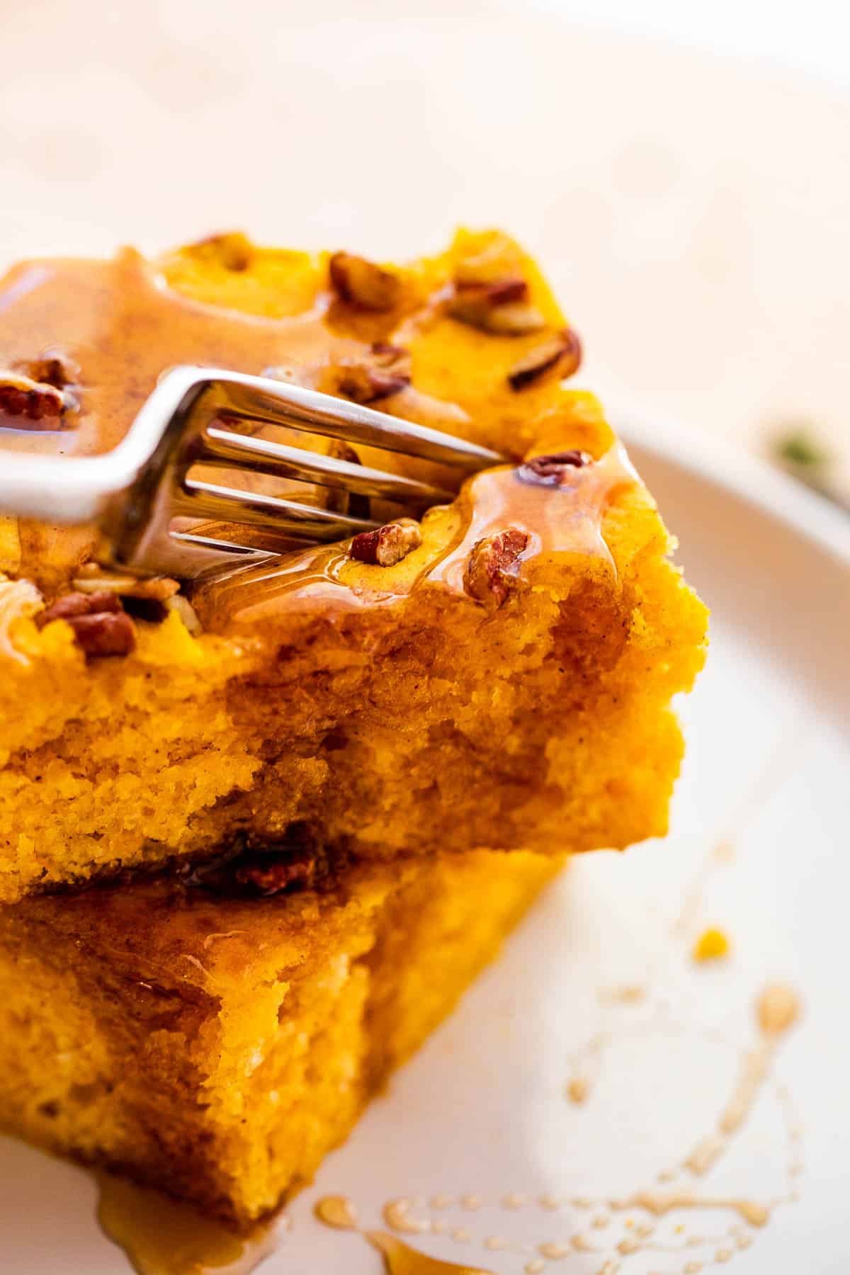 fork cutting into a pumpkin pancake