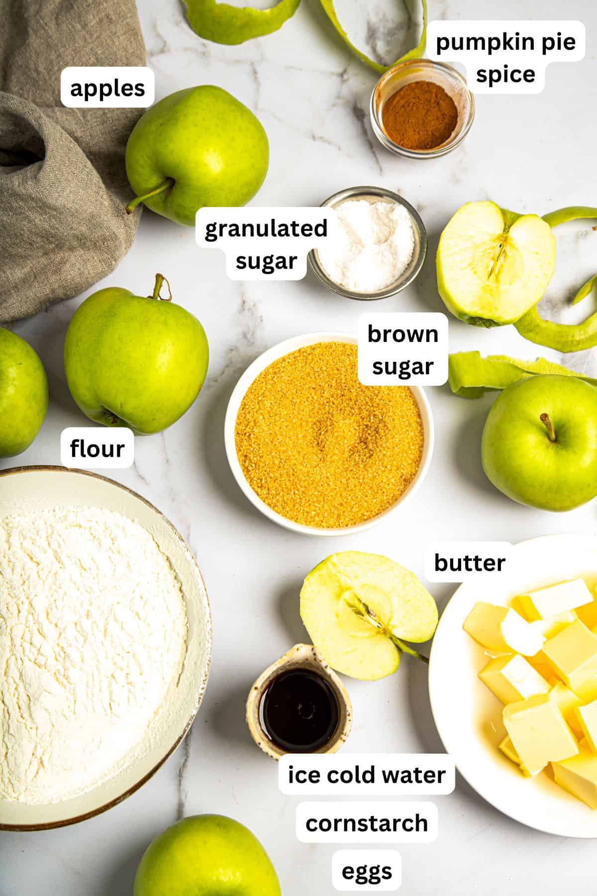 An image of ingredients used to make a homemade apple pie.