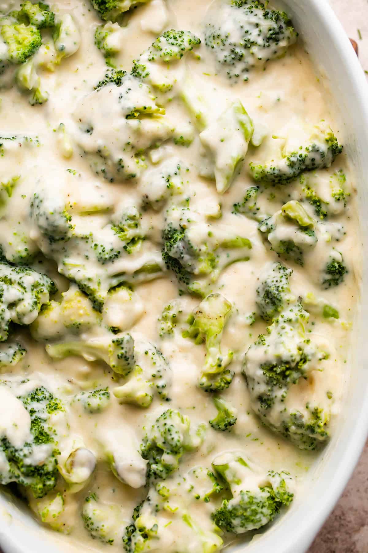 broccoli florets in a creamy cheese sauce.