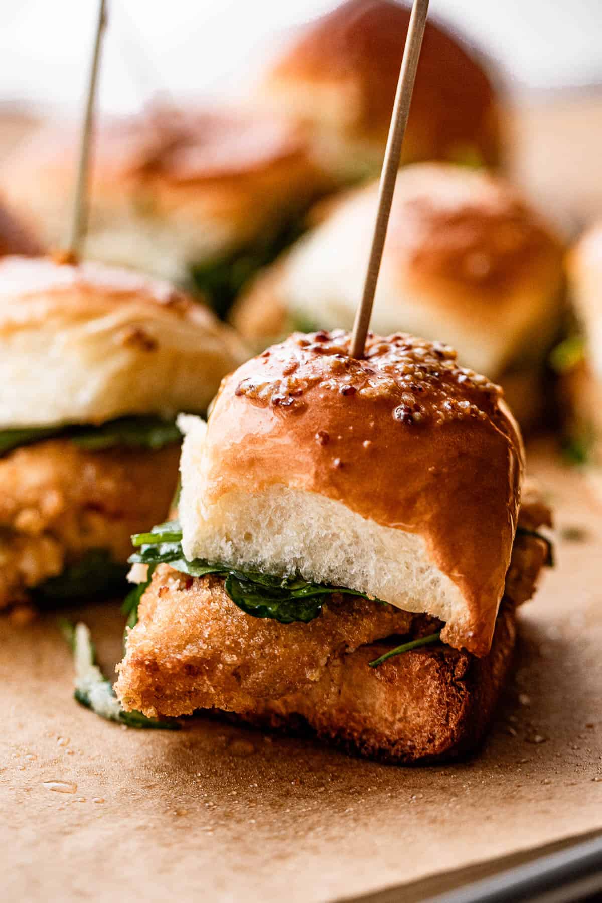 side shot of a slider with crab cakes.