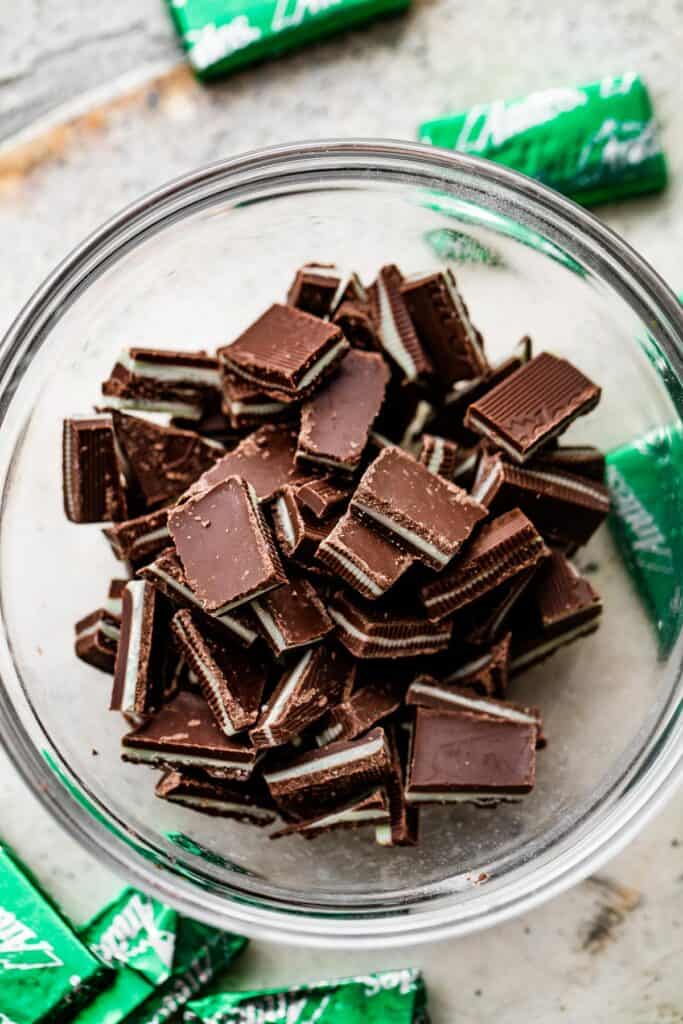 chopped chocolate mints in a small glass bowl.