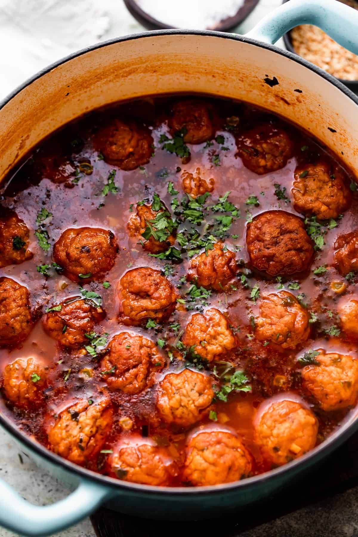overhead shot of a dutch oven with Albondigas Soup.