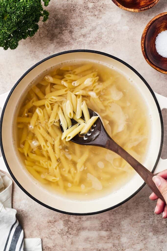 Pasta boiling in a large pot.