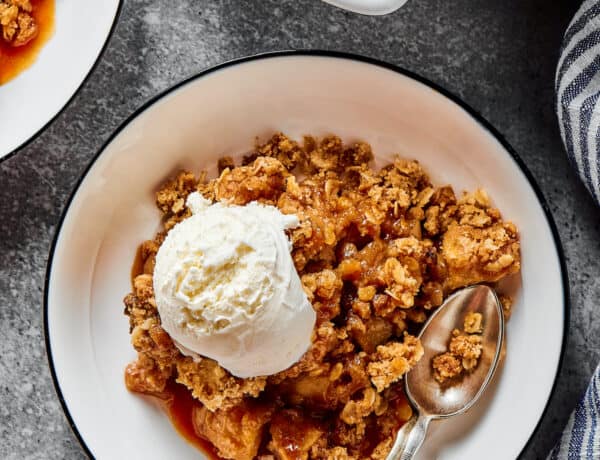 Ice-cream topped apple bake, with an oat topping.
