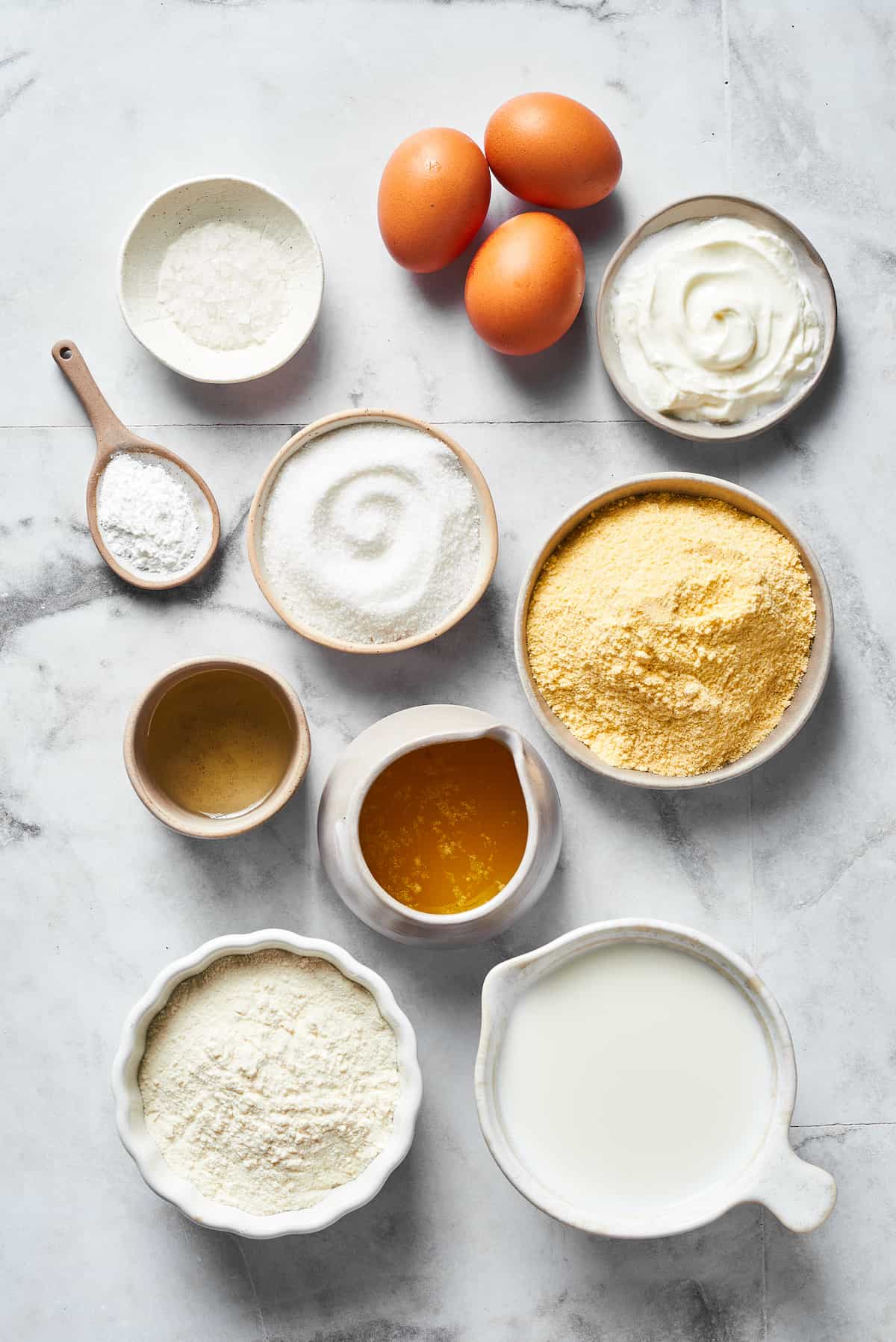From top: Salt, eggs, sour cream, baking powder, sugar, cornmeal, oil, melted butter, flour, milk.
