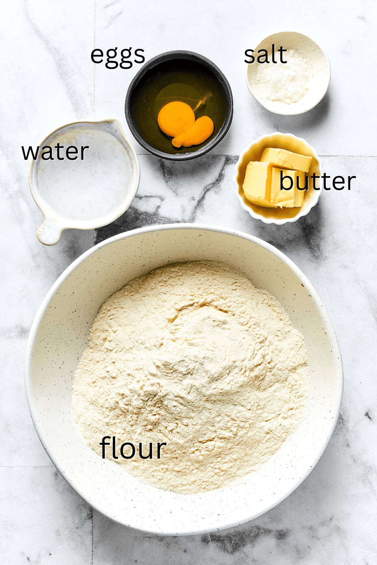 From top: Water, eggs, salt, butter, flour.