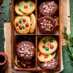 Chocolate and vanilla Christmas cake mix cookies in a decorative box.