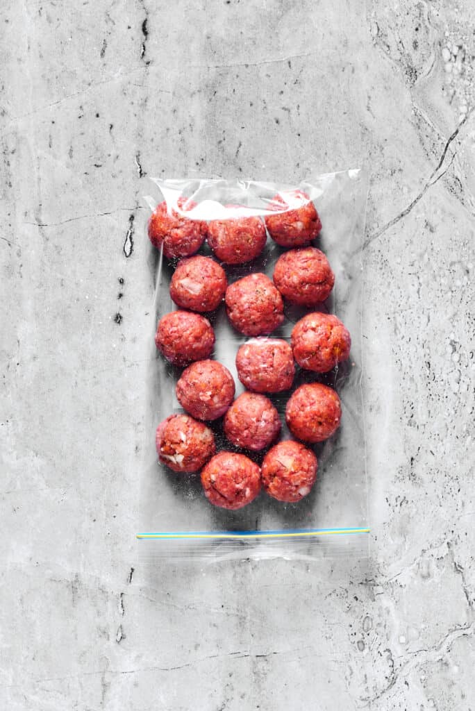 Frozen meatballs in a zip-top bag.