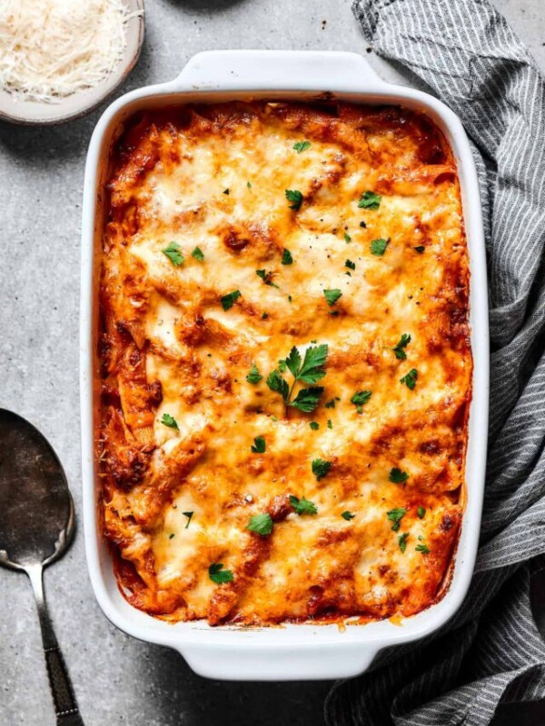 Baked mostaccioli garnished with herbs.