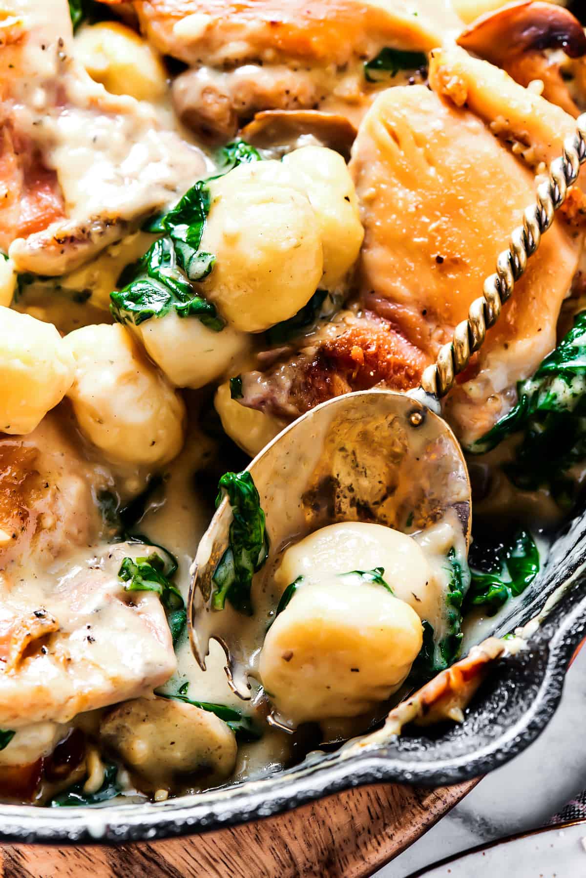 Close-up shot of a skillet dinner to show the texture of the ingredients.