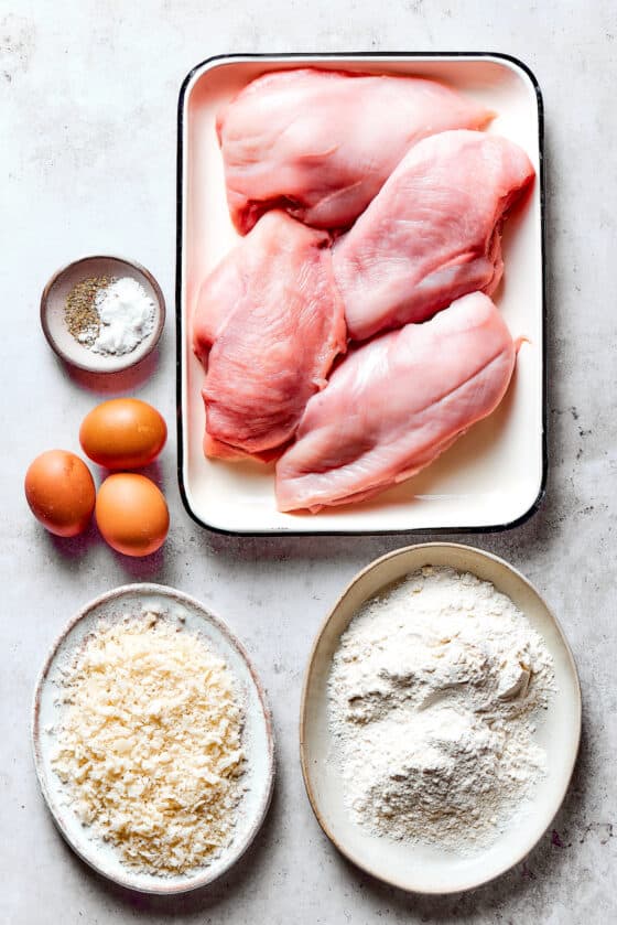 Chicken breast, flour, breadcrumbs, eggs, and seasonings.