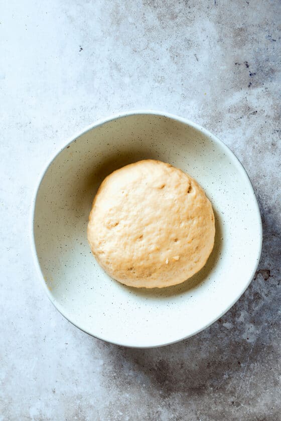 Dough resting in a bowl.