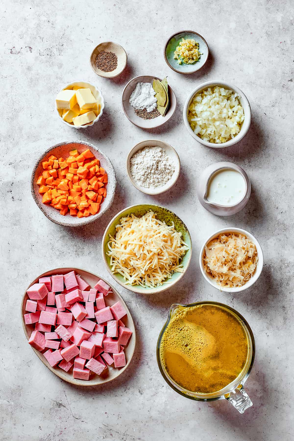 Ingredients for Reuben soup measured and arranged on a table.