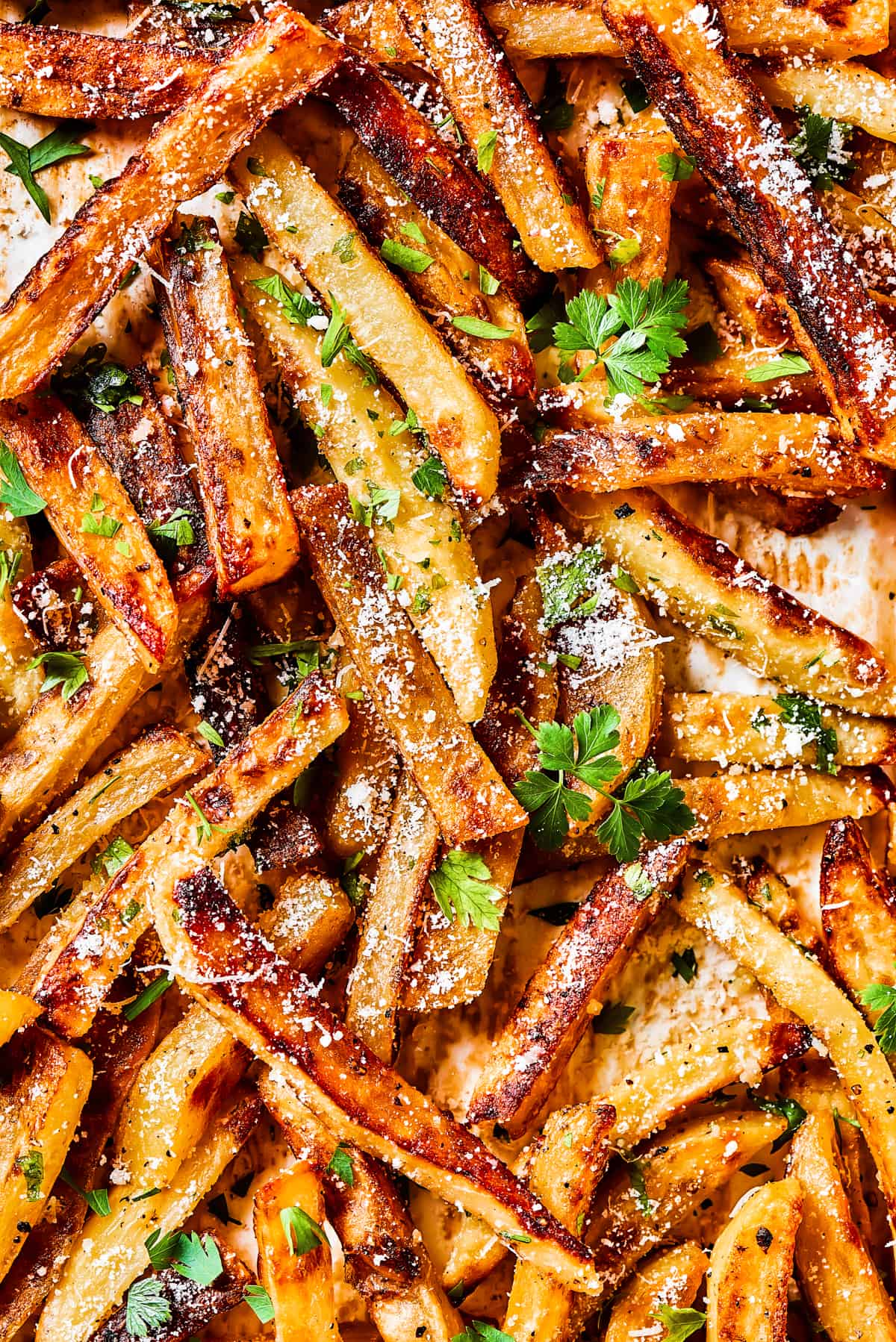 Seasoned garlic fries sprinkled with herbs and parmesan cheese.