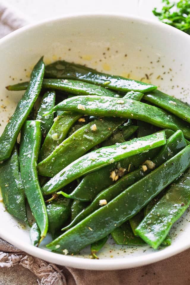 Blanched Italian Flat Beans served in a large white bowl.