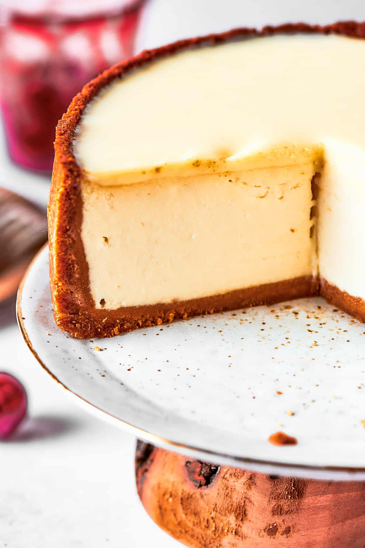 Close-up shot of the cut side of a cheesecake.