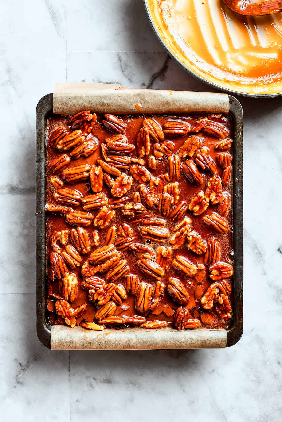 Pecan Praline Brownie Squares 10 The prepared pecan pie filling is generously poured over the warm brownie base.