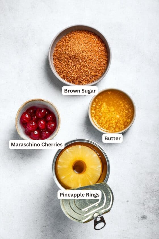 Topping ingredients are shown: pineapple rings, butter, brown sugar, cherries.